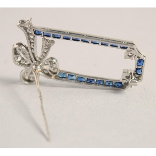 1580 - A GOOD PLATINUM DIAMOND AND SAPPHIRE DECO BOW BROOCH.