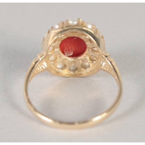 1586 - A 9CT GOLD CORAL AND PEARL RING.