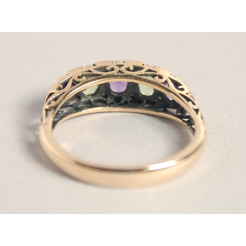 1597 - A 9CT GOLD AMETHYST, PERIDOT AND DIAMOND RING.