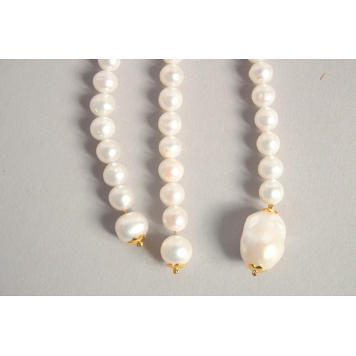 1611 - A PEARL NECKLACE with GOLD PLATED BUTTERFLY CLASP.