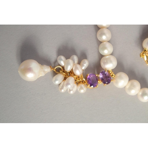 1613 - A PEARL NECKLACE with GOLD PLATED AMETHYST CLASP.