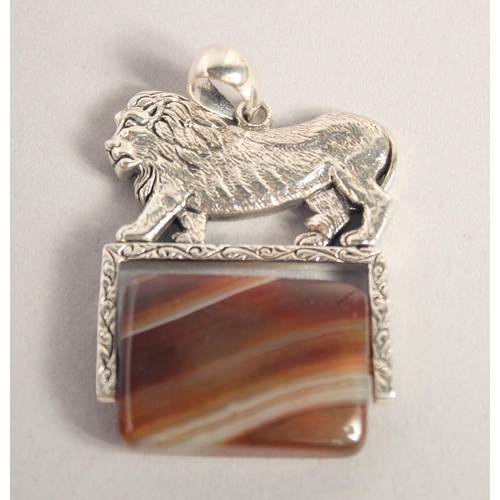 1626 - A SILVER AND AGATE LION FOB SEAL.