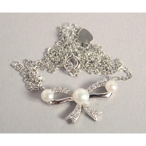 1629 - A SILVER PEARL SET RIBBON NECKLACE.