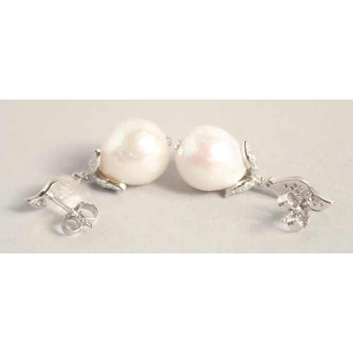 1630 - A PAIR OF SILVER BAROQUE PEARL EARRINGS.