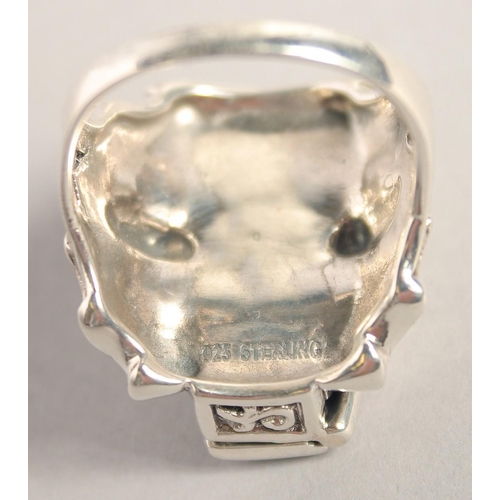 1639 - A SILVER AND BAT COFFIN RING.