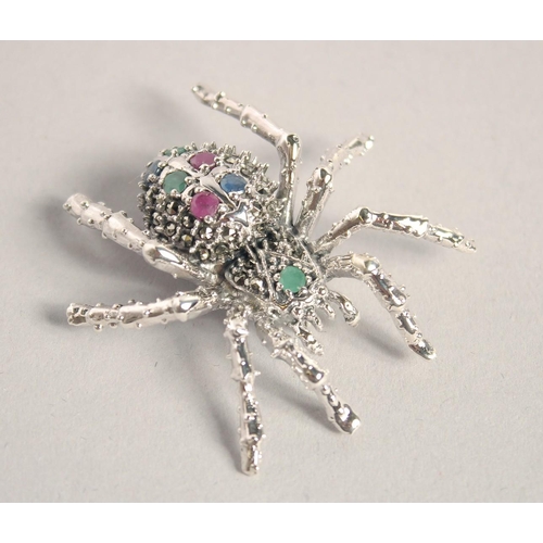 1641 - A LARGE SILVER RUBY, SAPPHIRE, AND EMERALD SPIDER BROOCH.