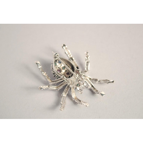 1641 - A LARGE SILVER RUBY, SAPPHIRE, AND EMERALD SPIDER BROOCH.