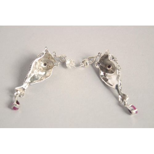 1654 - A PAIR OF SILVER, RUBY, MARCASITE PANTHER EARRINGS.