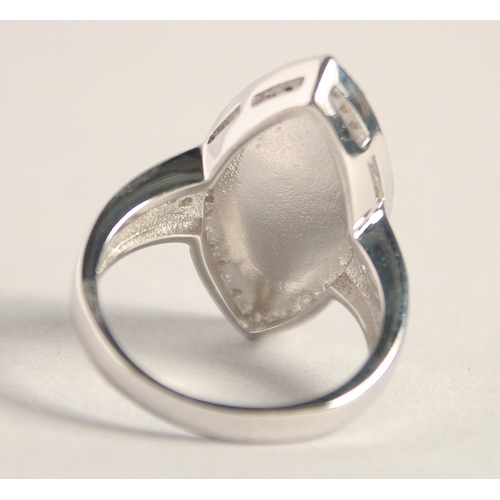 1657 - A SILVER GILSON OPAL RING.