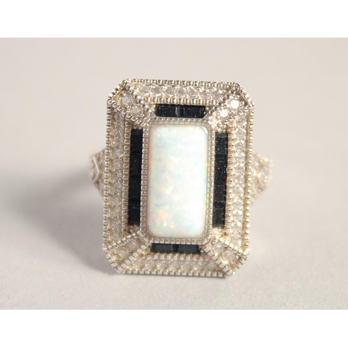 1661 - A SILVER DECO STYLE OPAL RING.