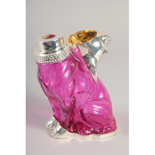 1673 - A CRANBERRY GLASS AND SILVER PLATED DOG CLARET JUG.