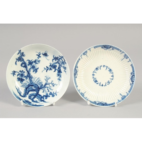 1063 - AN 18TH CENTURY WORCESTER TEA BOWL AND SAUCER painted with Prunus Root and a ribbed tea bowl and sau... 