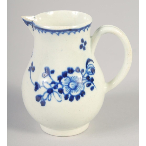 1068 - AN 18TH CENTURY LIVERPOOL JUG painted in underglaze blue with flowers with external line and loop bo... 