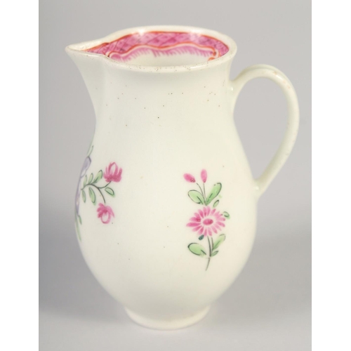 1070 - AN 18TH CENTURY WORCESTER JUG painted with flowers and an internal pink diaper border.