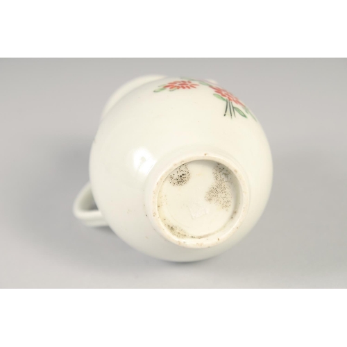 1070 - AN 18TH CENTURY WORCESTER JUG painted with flowers and an internal pink diaper border.