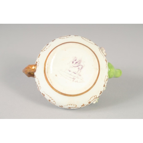 1080 - A 19TH CENTURY ROCKINGHAM MINIATURE TEA POT AND COVER encrusted with flowers, printed griffin mark.