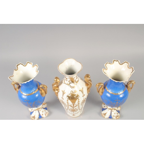 1087 - A 19TH CENTURY ROCKINGHAM PAIR OF VASES with bird head handles painted with flowers in panels on a b... 