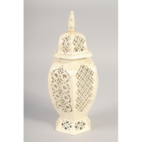 1089 - A LATE 19TH CENTURY LEEDS CREAMWARE VASE AND COVER, the body having alternating pierced panels.