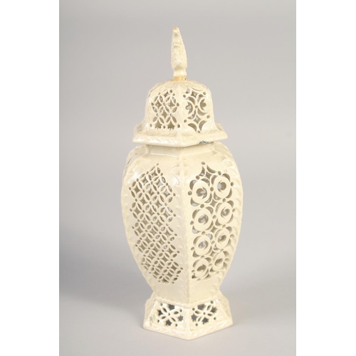 1089 - A LATE 19TH CENTURY LEEDS CREAMWARE VASE AND COVER, the body having alternating pierced panels.