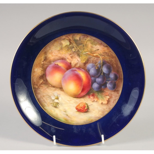 1091 - A ROYAL WORCESTER BLUE GROUND PLATE painted with plums and grapes by R Sebright, signed date mark 19... 