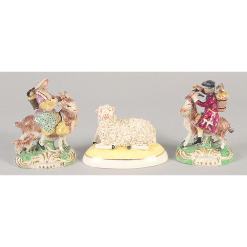 1096 - A 19TH CENTURY STAFFORDSHIRE FIGURE OF THE WELSH TAILOR AND COMPANION together with a later sheep.