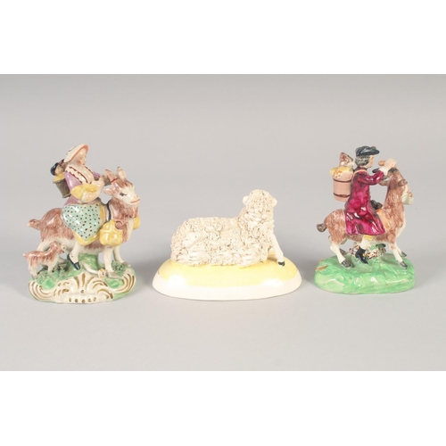 1096 - A 19TH CENTURY STAFFORDSHIRE FIGURE OF THE WELSH TAILOR AND COMPANION together with a later sheep.