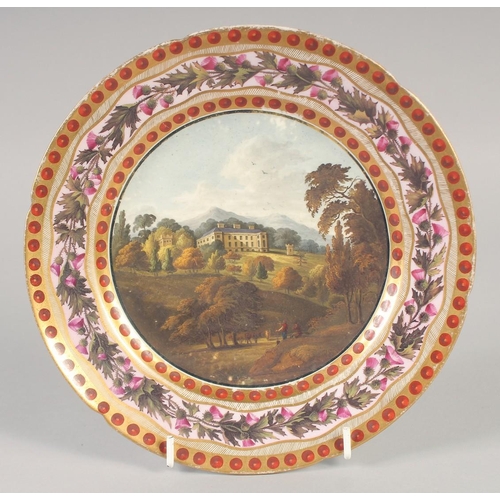 1098 - AN 18TH CENTURY ENGLISH PORCELAIN PLATE painted with a stately residence.