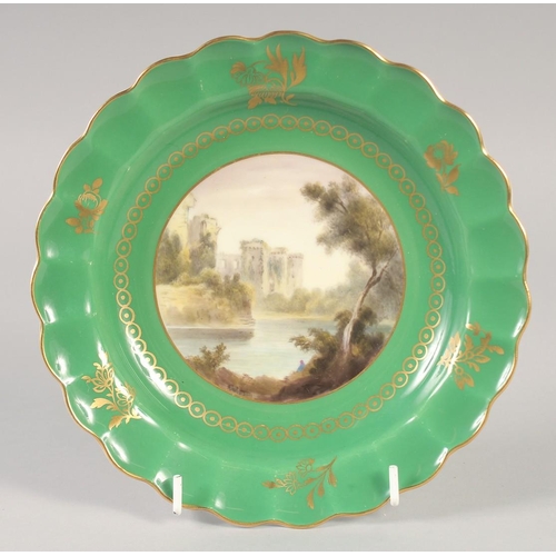 1102 - A ROYAL WORCESTER PLATE painted with view of Ragland Castle by GEORGE JOHNSON, signed, date mark 191... 