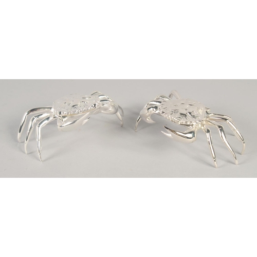 1677 - A PAIR OF SILVER PLATED CRAB SALTS.