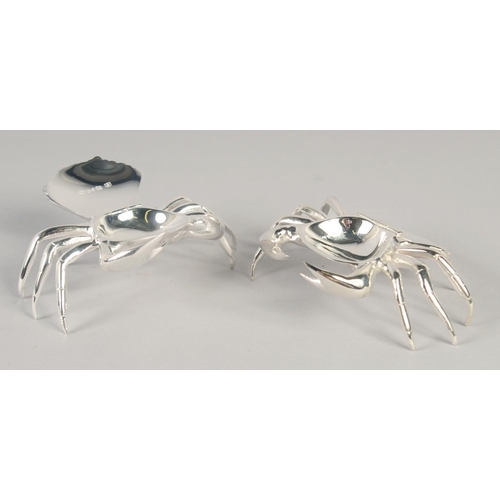 1677 - A PAIR OF SILVER PLATED CRAB SALTS.