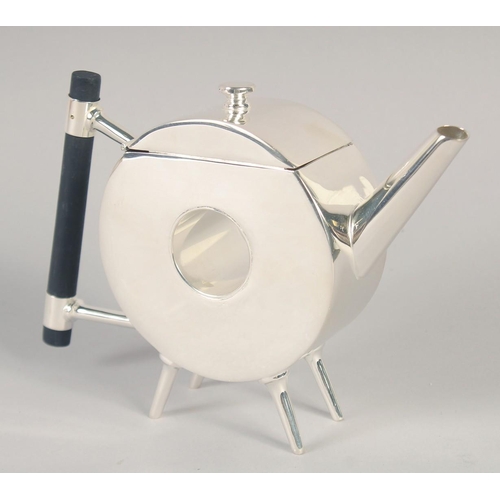 1678 - A CHRISTOPHER DRESSER STYLE SILVER PLATED CIRCULAR TEA POT.