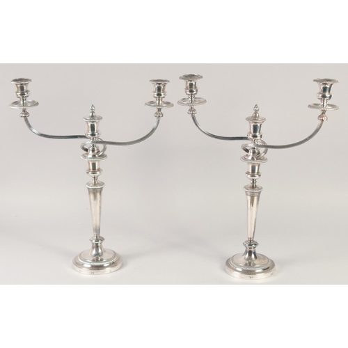 1682 - A GOOD PAIR OF MATTHEW BOLTON SHEFFIELD PLATE THREE LIGHT CANDELABRAS, circular bases, tapering colu... 