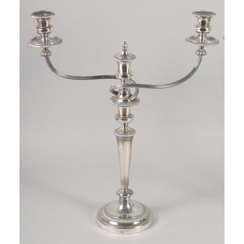 1682 - A GOOD PAIR OF MATTHEW BOLTON SHEFFIELD PLATE THREE LIGHT CANDELABRAS, circular bases, tapering colu... 