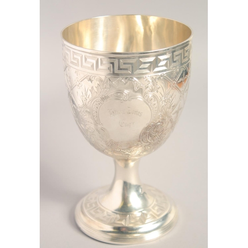 1694 - A GOOD BRIGHT CUT SILVER GOBLET with key pattern, acanthus and other decoration. 7ins high.