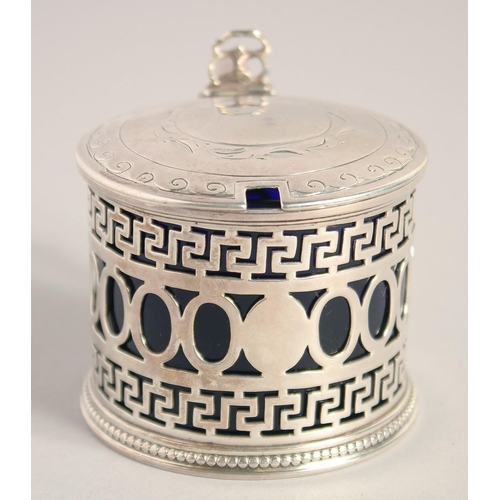 1696 - A VICTORIAN CIRCULAR PIERCED MUSTARD POT AND COVER with handles and sapphire blue liner. Birmingham ... 