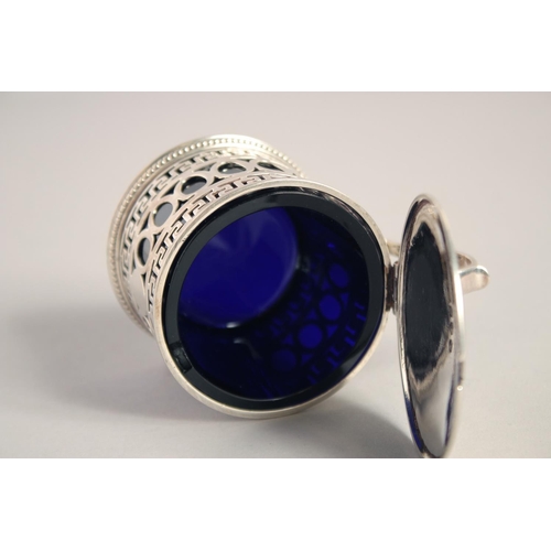 1696 - A VICTORIAN CIRCULAR PIERCED MUSTARD POT AND COVER with handles and sapphire blue liner. Birmingham ... 