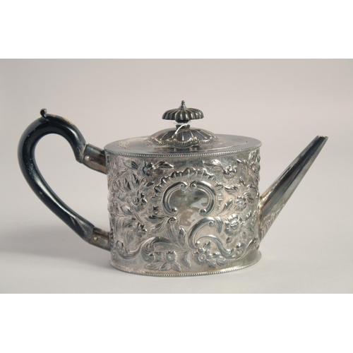 1698 - A GEORGE III OVAL TEA POT AND COVER repousse with flowers and scrolls. London 1784, Intaglio mark. G... 