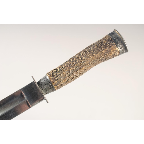 108 - A GERMAN HUNTING DIRK, mid-19th century, straight fullered blade, stag horn grip with iron mounts, i... 