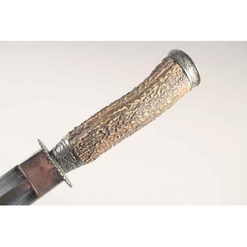 108 - A GERMAN HUNTING DIRK, mid-19th century, straight fullered blade, stag horn grip with iron mounts, i... 