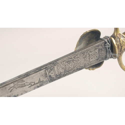 120 - A FRENCH HUNTING HANGER, early 18th century, straight double fullered engraved blade, brass shell gu... 