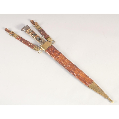 123 - A GERMAN HUNTING DIRK, mid-19th century, stiff fullered spear pointed blade with gold inlaid running... 