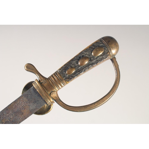 124 - A GERMAN HUNTING SWORD, early 19th century. straight double edged blue & gilt decorated blade, brass... 