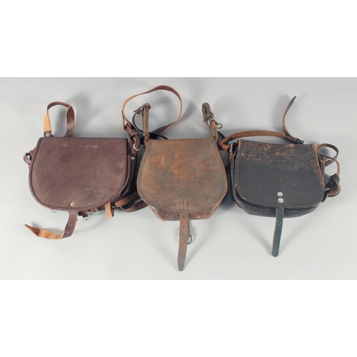 13 - THREE LEATHER HUNTING BAGS.