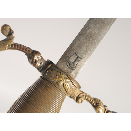 141 - A CONTINENTAL COURT SWORD, late 19th century, slender oval section straight blade, gilt quillon & kn... 