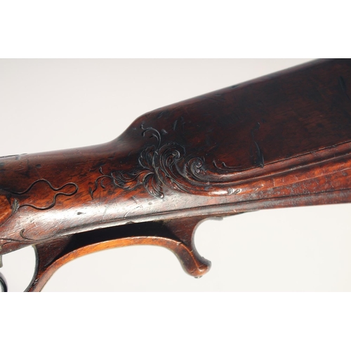 149 - A GERMAN FLINTLOCK SPORTING GUN, circa 1750, Spanish three stage 28 bore 32in barrel, walnut half st... 