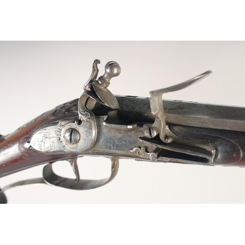 150 - A FINE GERMAN FLINTLOCK SPORTING GUN, circa 1740, Spanish form 18 bore 44in barrel signed at the bre... 