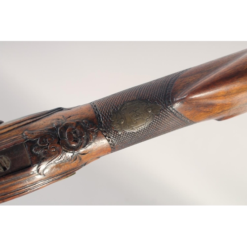 152 - A GERMAN FLINTLOCK SPORTING GUN, dated 1768, 13 bore octagonal 29.5 in barrel, indistinctly signed &... 