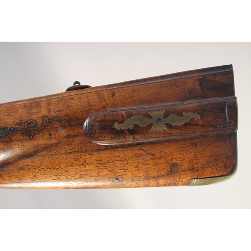 152 - A GERMAN FLINTLOCK SPORTING GUN, dated 1768, 13 bore octagonal 29.5 in barrel, indistinctly signed &... 