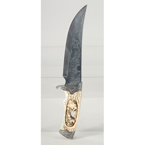 17 - A KNIFE WITH A STAINLESS STEEL BLADE, engraved with a fox and cubs with antler handle carved and pie... 