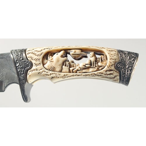 17 - A KNIFE WITH A STAINLESS STEEL BLADE, engraved with a fox and cubs with antler handle carved and pie... 